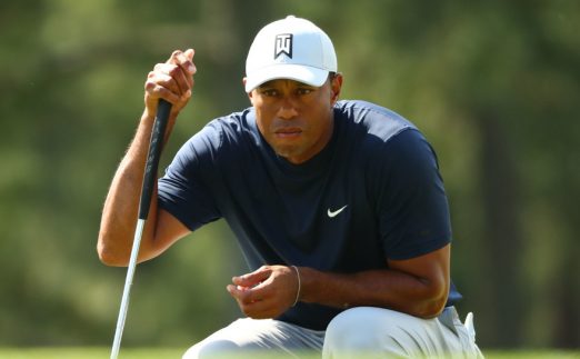 Tiger Woods assessing shot