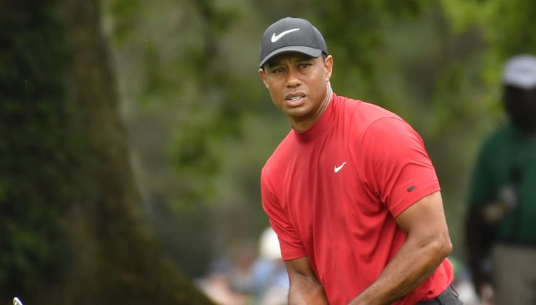 Tiger Woods looking on