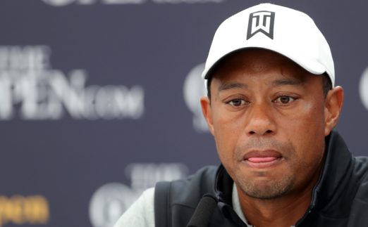 Tiger Woods talking to press