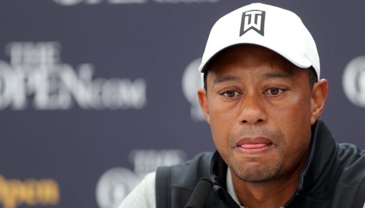Tiger Woods talking to press