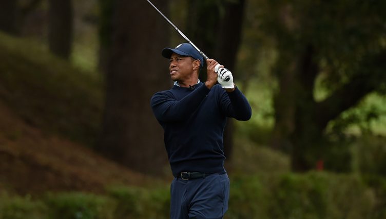Tiger Woods pitching in Japan