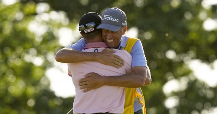 Justin Thomas and caddie