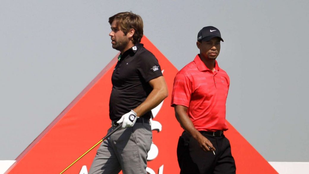 Robert Rock and Tiger Woods at the Abu Dhabi Championship in 2012