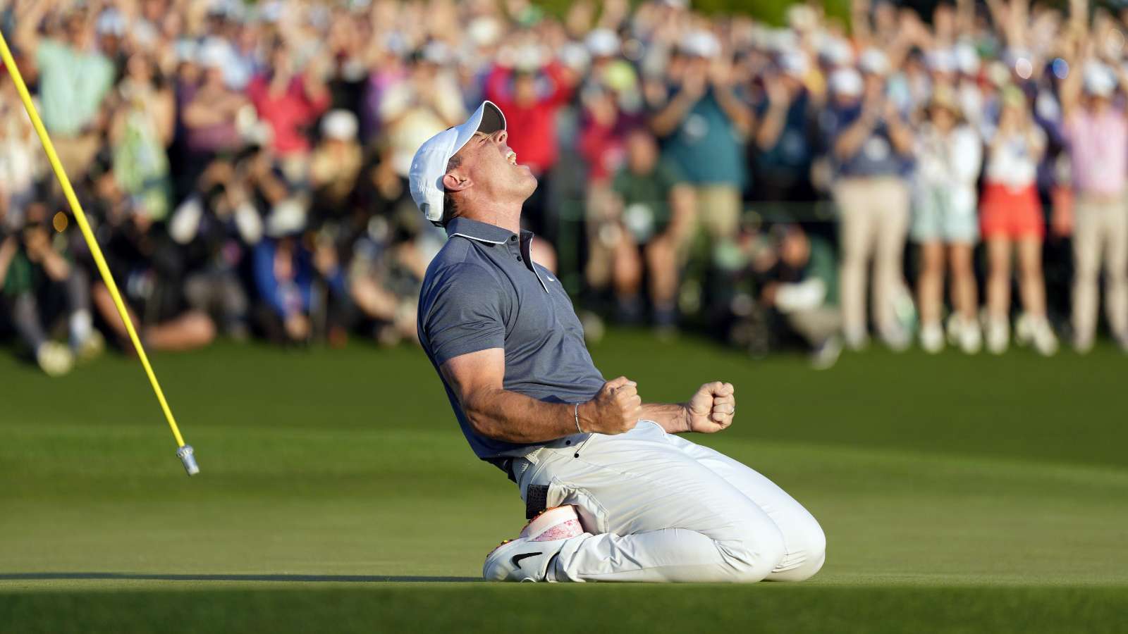 Rory McIlroy celebrates 18th hole Masters