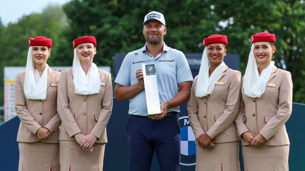 Daniel Brown poses with the BMW International Open trophy in Germany.