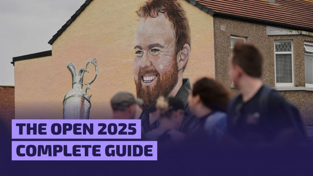 People stop and look at a mural of golfer Shane Lowry of Ireland, holding the Claret Jug trophy, in Portrush