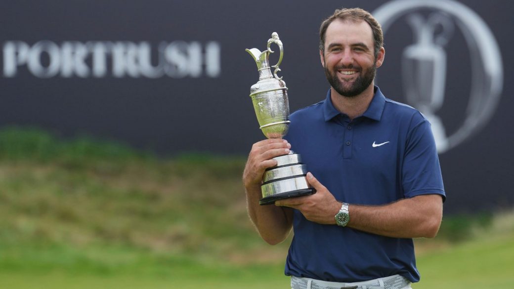 Scottie Scheffler lifts the Claret Jug after his 2025 Open Championship win