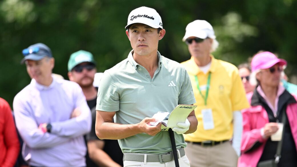 Collin Morikawa looking at caddie notes and deciding which golf shot to play.