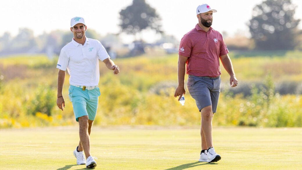 Joaquin Niemann and Jon Rahm on the golf course in a tense match.