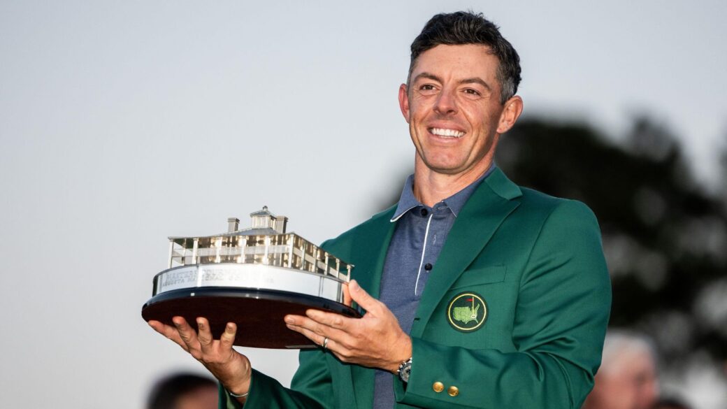 Rory McIlroy celebrates his Masters win and trophy. One of his biggest career pay cheques.