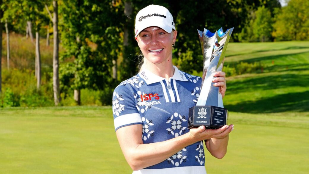 LPGA golfer Charley Hull poses with the trophy after winning the Kroger Queen City Championship