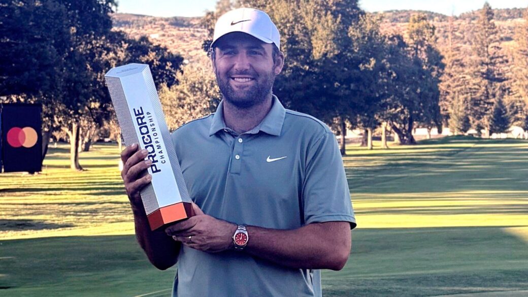 Scottie Scheffler lifts the 2025 Procore Championship trophy