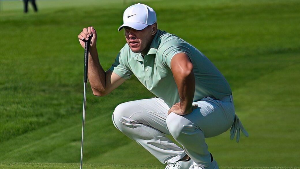 Brooks Koepka lines up a putt on the 5th hole during the third round of the Farmers Insurance Open