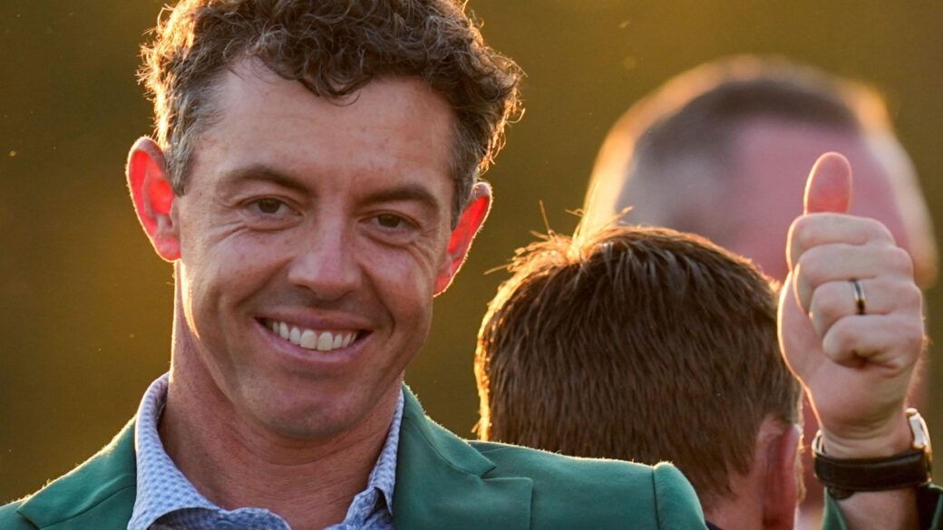 Rory McIlroy, of Northern Ireland, gives a thumbs up after winning the Masters golf tournament at the Augusta National Golf Club