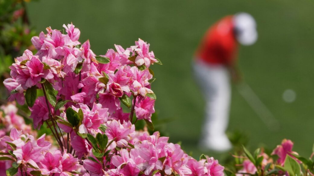 Sungjae Im, of South Korea, chips to the green on the 16th hole during a practice round ahead of the Masters golf tournament