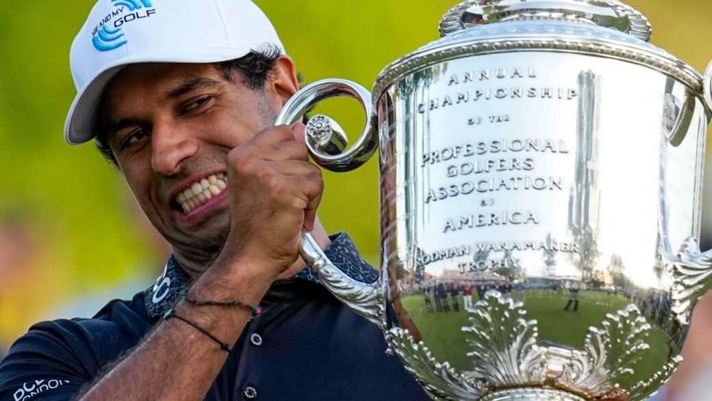 Aaron Rai lifts the PGA Championship trophy