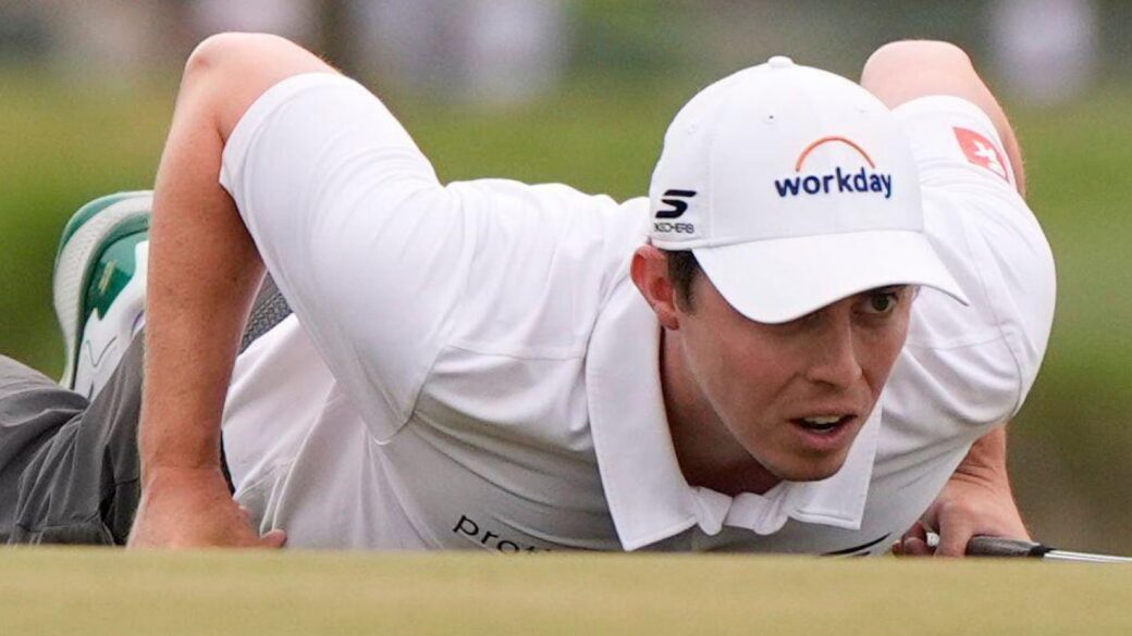 Matt Fitzpatrick reads the green at Augusta